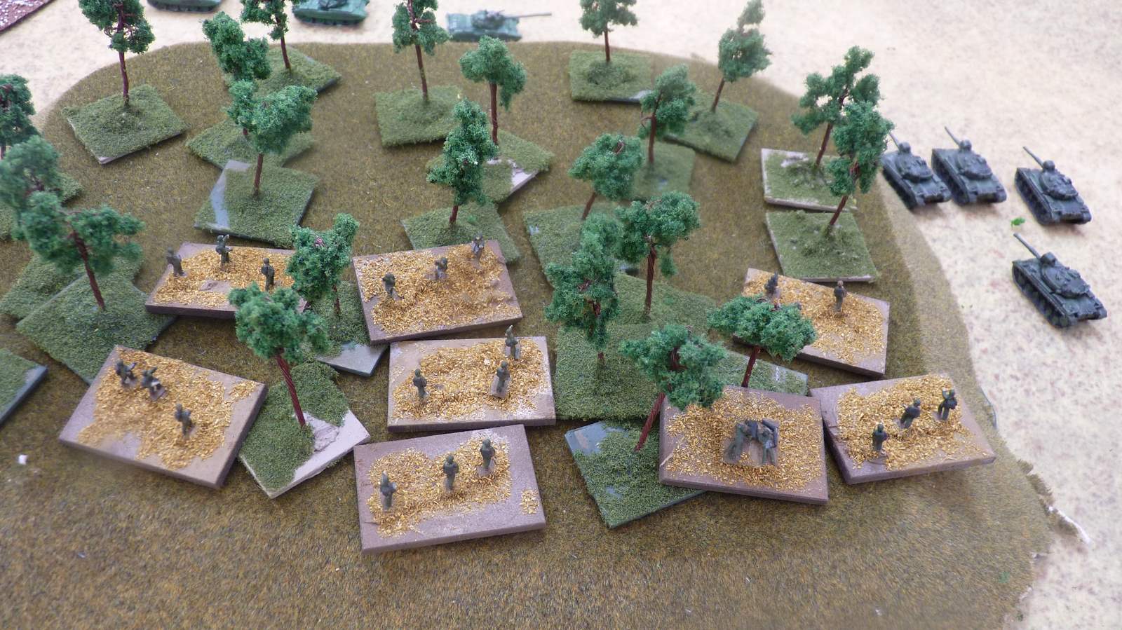 Turkish infantry dismount and seize the wooded hill